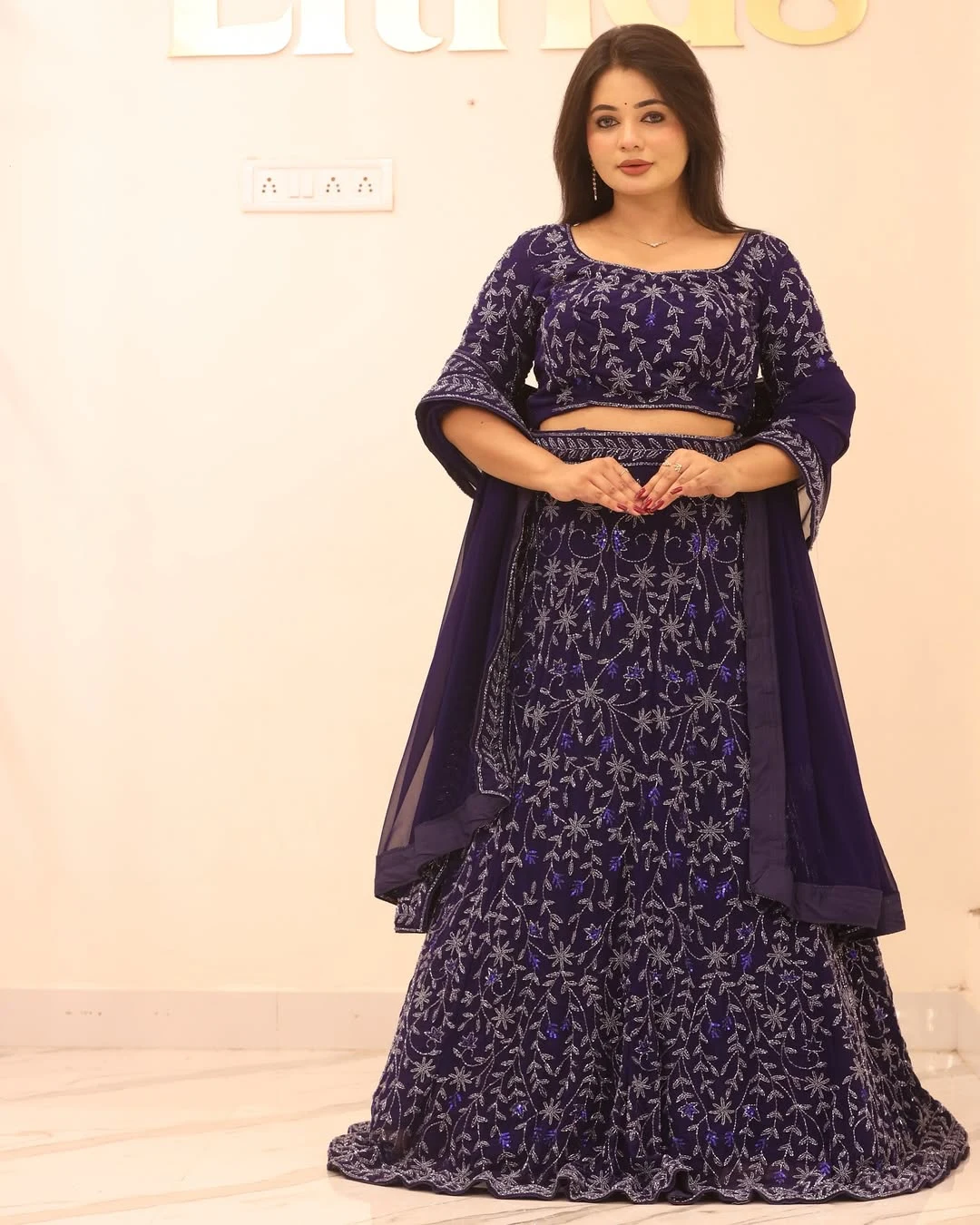 Woman in a designer gown for rent for wedding events