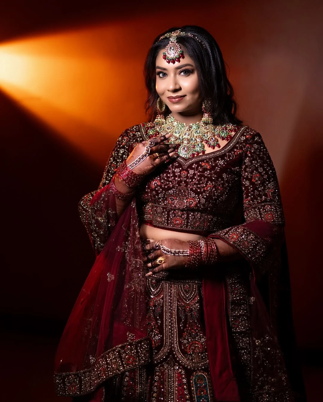 Close-up of a groom's embroidered Achkan for rental